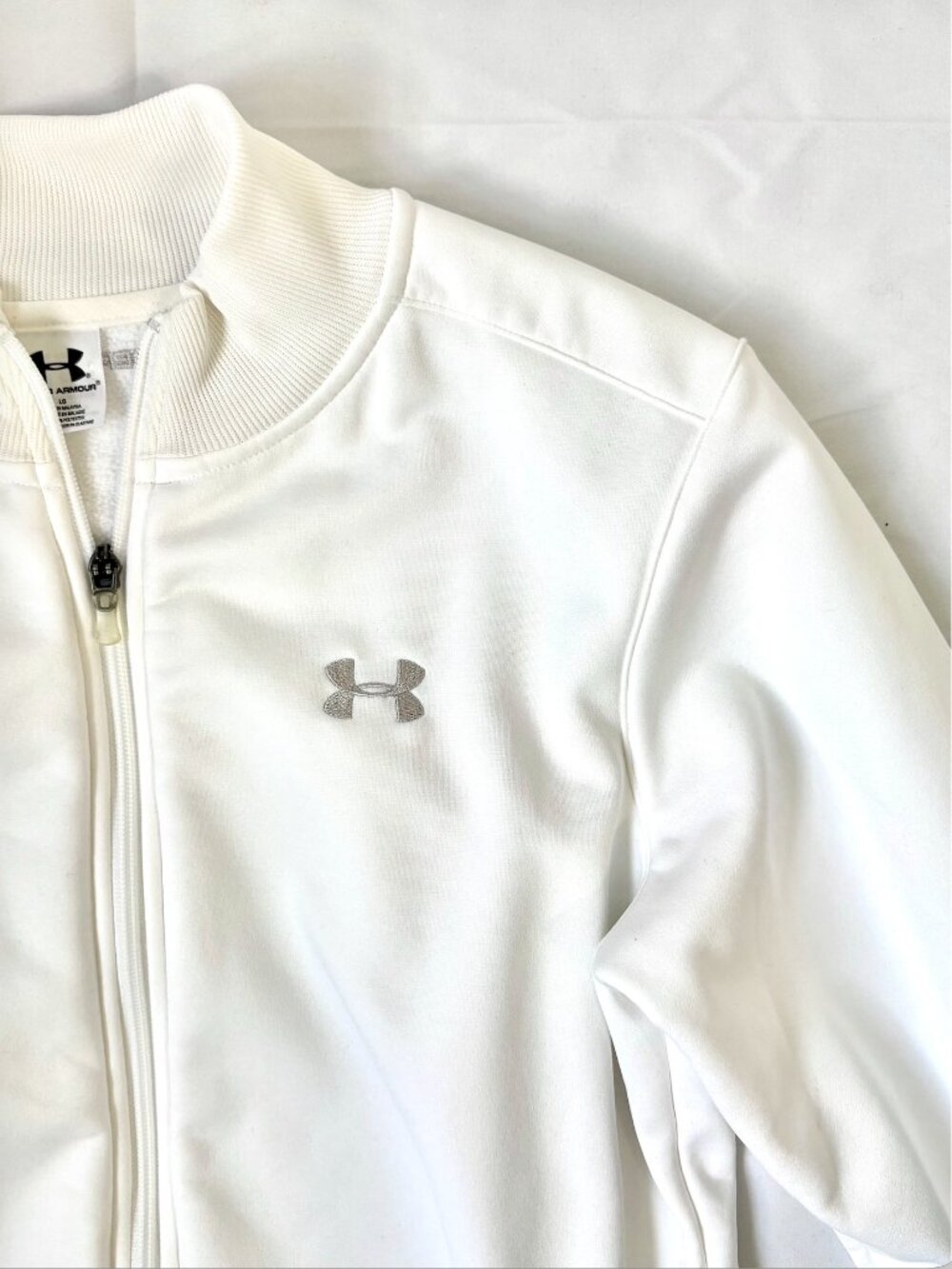 Under Armour White Long Sleeve Full Zip with Embroidered Silver Logo | Large